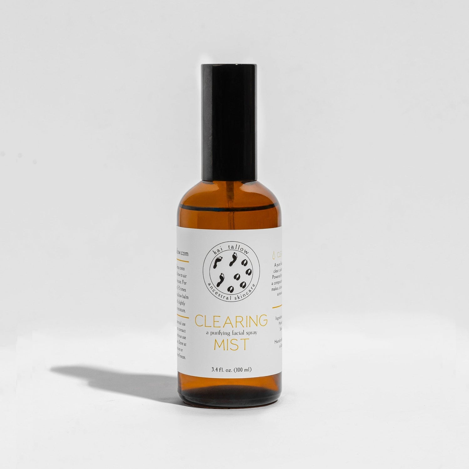 Kai Tallow Clearing Mist hypochlorous acid facial spray in an amber glass bottle with a pump top